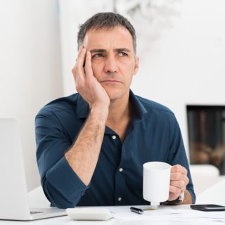 worried-man-at-desk